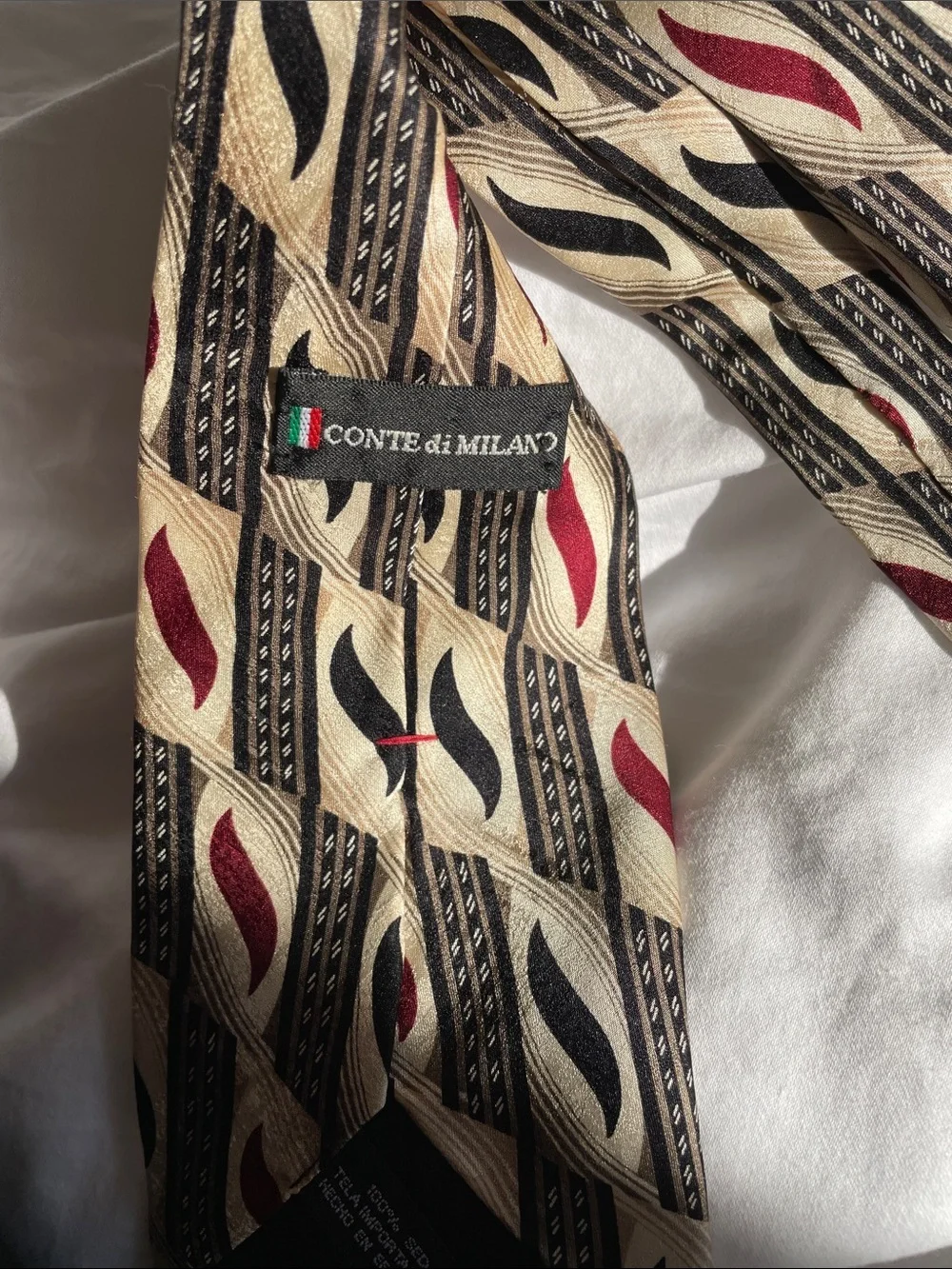 Conte Di Milano Men's Cream Patterned Tie with Red & Black Accents